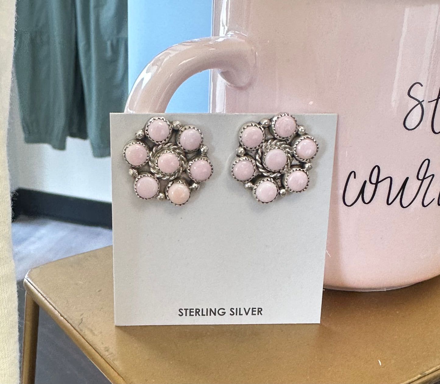 Pink conch studs