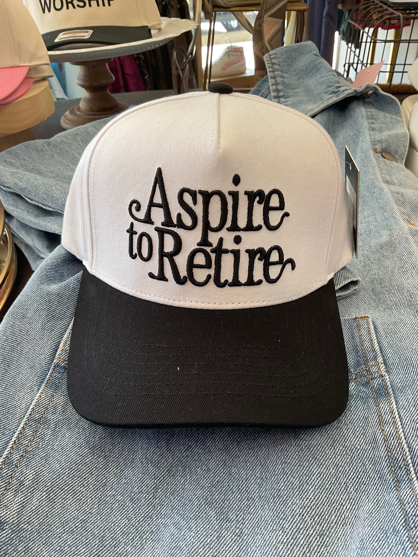 Aspire To Retire Trucker Hat