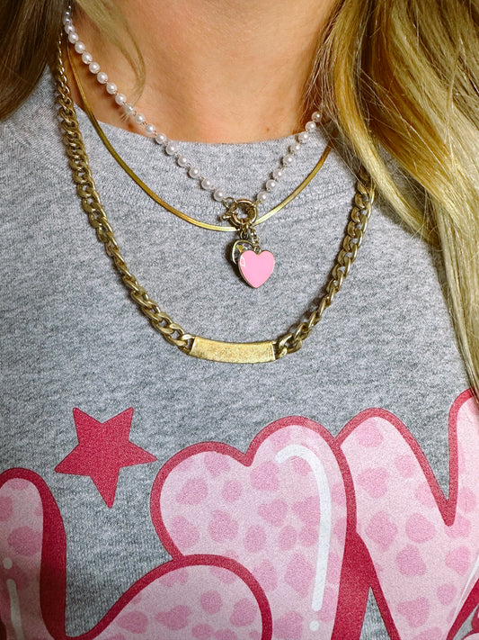 Pink heart charm necklace